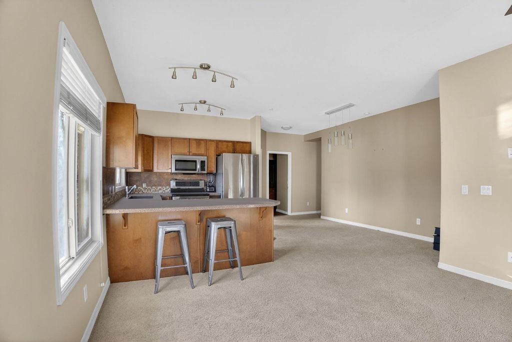 Photo of 92 Crystal Shores Road #4103, Okotoks, AB T1S 2N2 (MLS # A2286784)