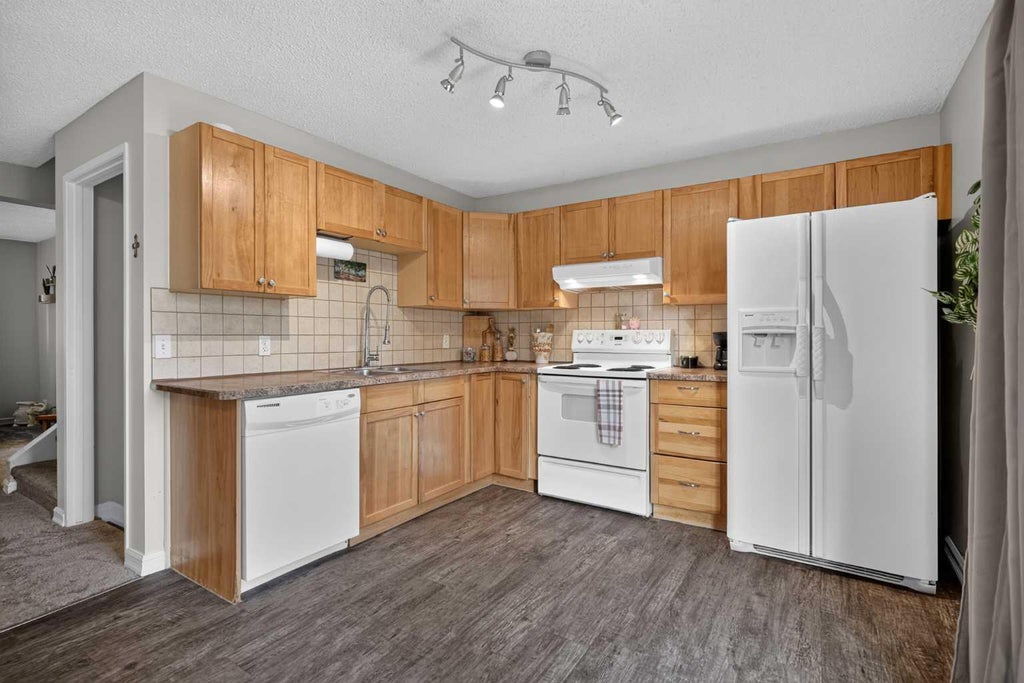 Photo of 380 Bermuda Drive NW #45, Calgary, AB T3K 2B2 (MLS # A2334821)