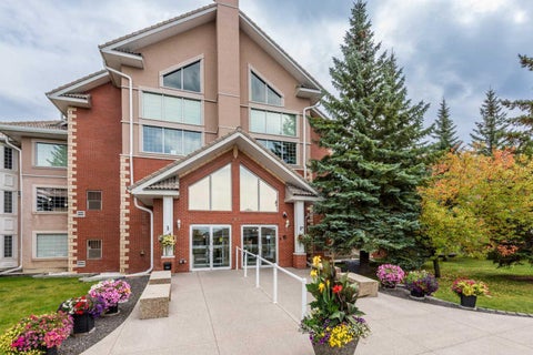 Photo of 6868 Sierra Morena Boulevard SW #104, Calgary, AB T3H 3R6 (MLS # A2348157)
