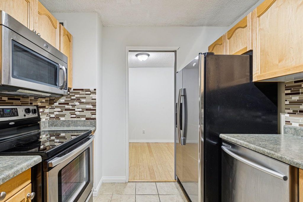 Photo of 537 14 Avenue SW #404, Calgary, AB T2R 0M7 (MLS # A2279636)