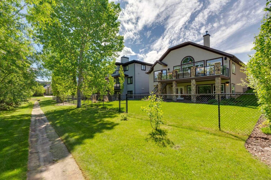 Photo of 51 Lott Creek Landing, Rural Rocky View County, AB T2Z 3V4 (MLS # A2319024)