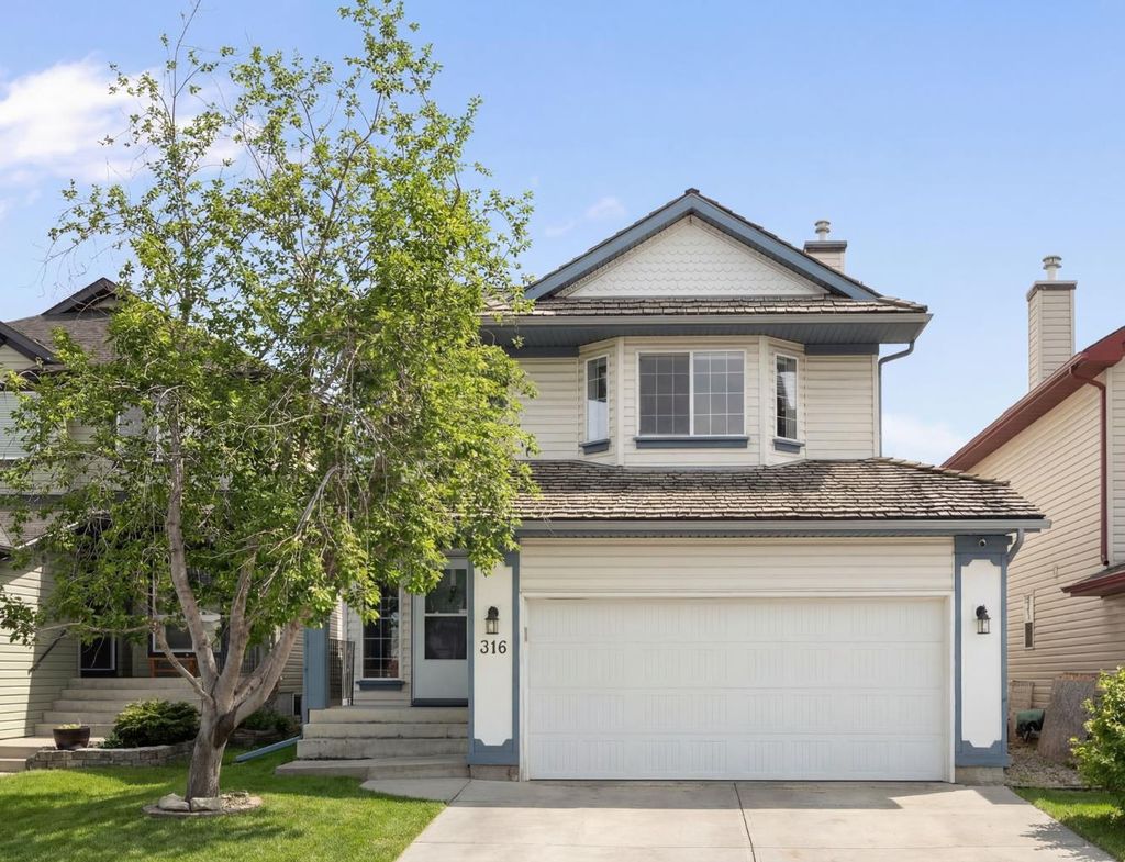Photo of 316 Mt Brewster Circle SE, Calgary, AB T2Z 3J2 (MLS # A2296159)