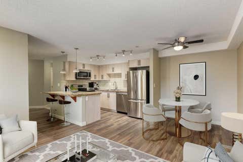 Photo of 108 Country Village Circle NE #301, Calgary, AB T3K 0E3 (MLS # A2330310)
