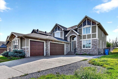 Photo of 115 Coulee Way SW, Calgary, AB T3H 0S4 (MLS # A2339895)