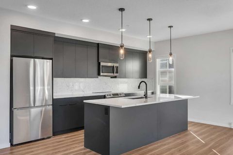 360 Harvest Hills Way NE 201 Calgary AB T3K 4K4