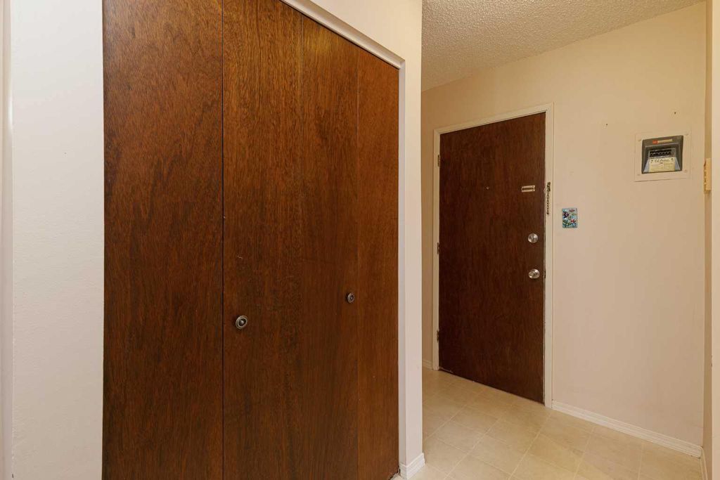 Photo of 6464 Travois Crescent NW #205, Calgary, AB T2K 3S9 (MLS # A2302757)