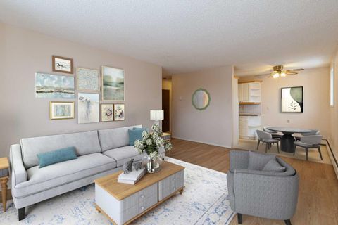 Photo of 6464 Travois Crescent NW #205, Calgary, AB T2K 3S9 (MLS # A2302757)