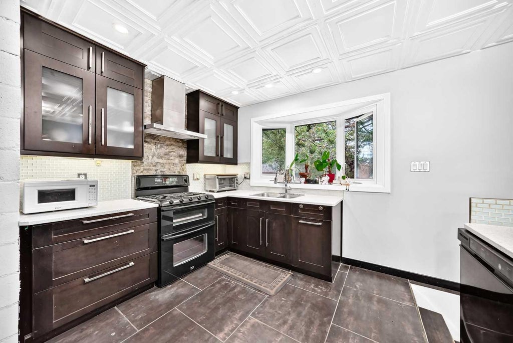 Photo of 4832 Worcester Drive SW, Calgary, AB T3C 3L6 (MLS # A2337547)