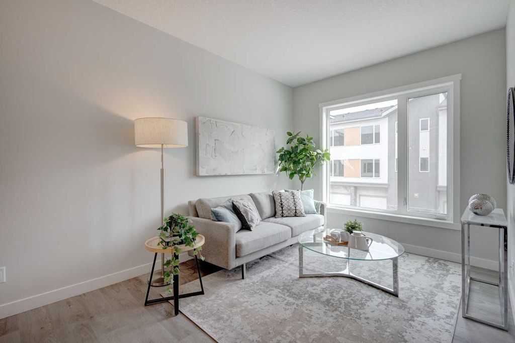 Photo of 212 Shawnee Square SW, Calgary, AB T2Y 0T7 (MLS # A2308350)