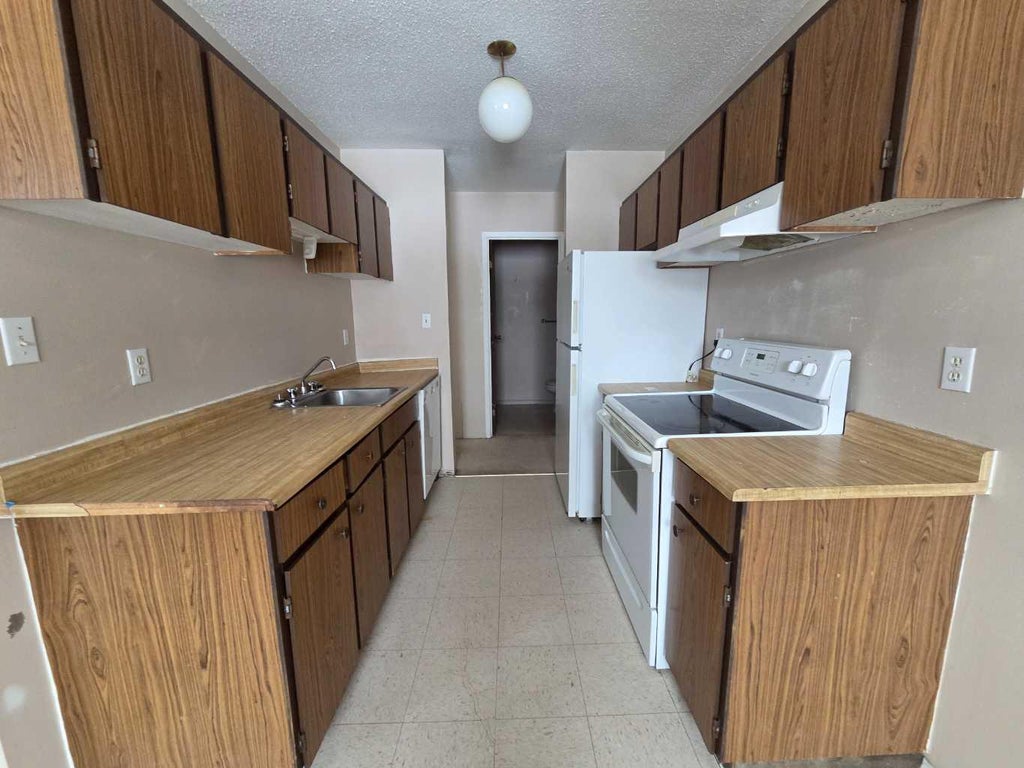 Photo of 5317 5 Avenue Ave #301, Edson, AB T7E 1P7 (MLS # A2350512)