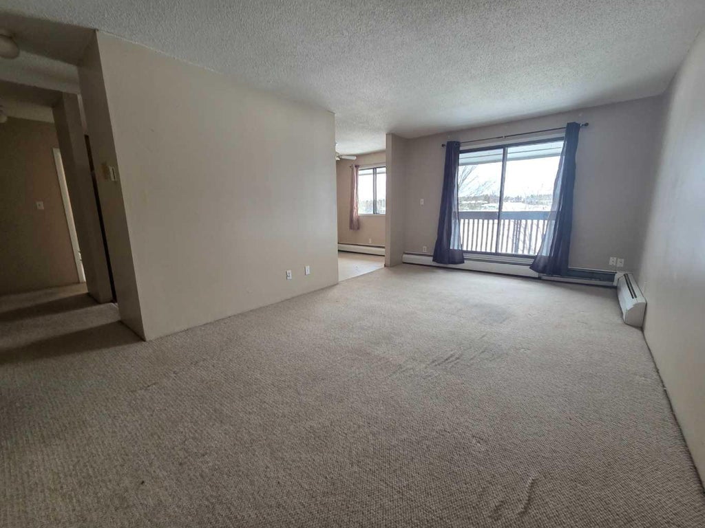 Photo of 5317 5 Avenue Ave #301, Edson, AB T7E 1P7 (MLS # A2350512)