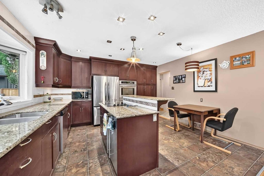 Photo of 728 Willacy Drive SE, Calgary, AB T2J 2B1 (MLS # A2338787)