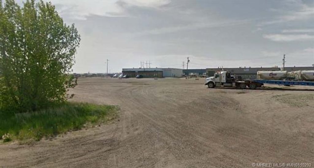 Photo of 1525 Brier Park Road NW, Medicine Hat, AB T1C 1V2 (MLS # MH0110292)