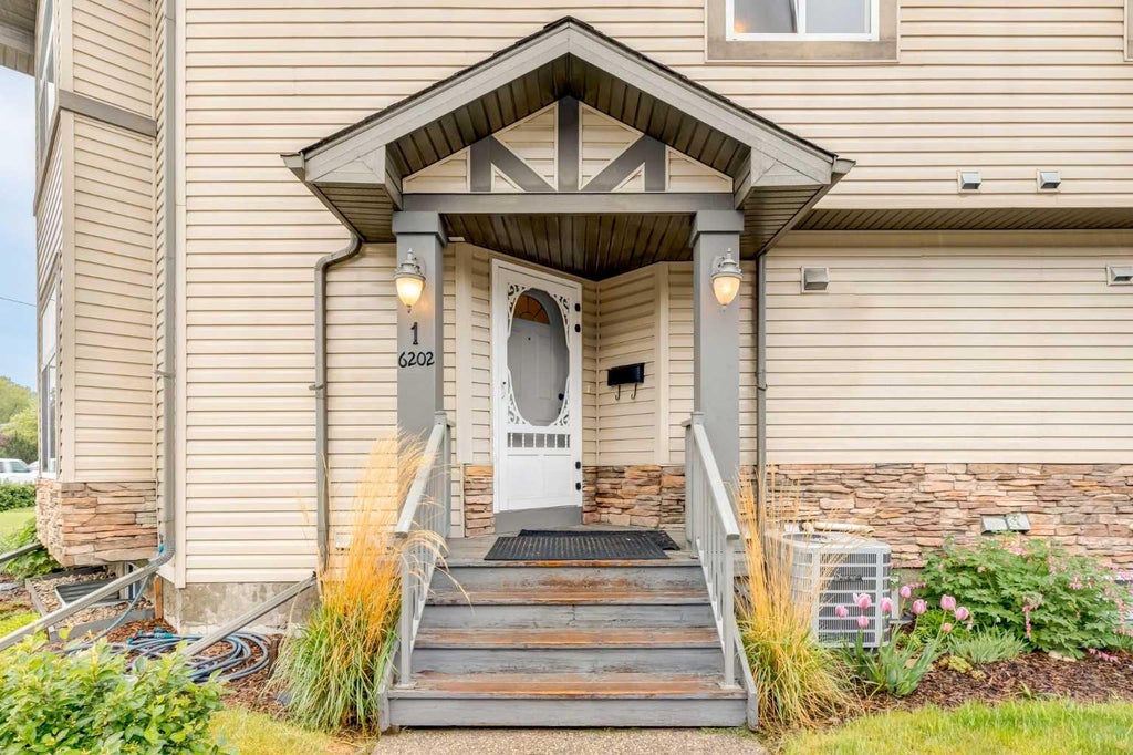 Photo of 6202 Bowness Road NW #1, Calgary, AB T3B 0E3 (MLS # A2317324)