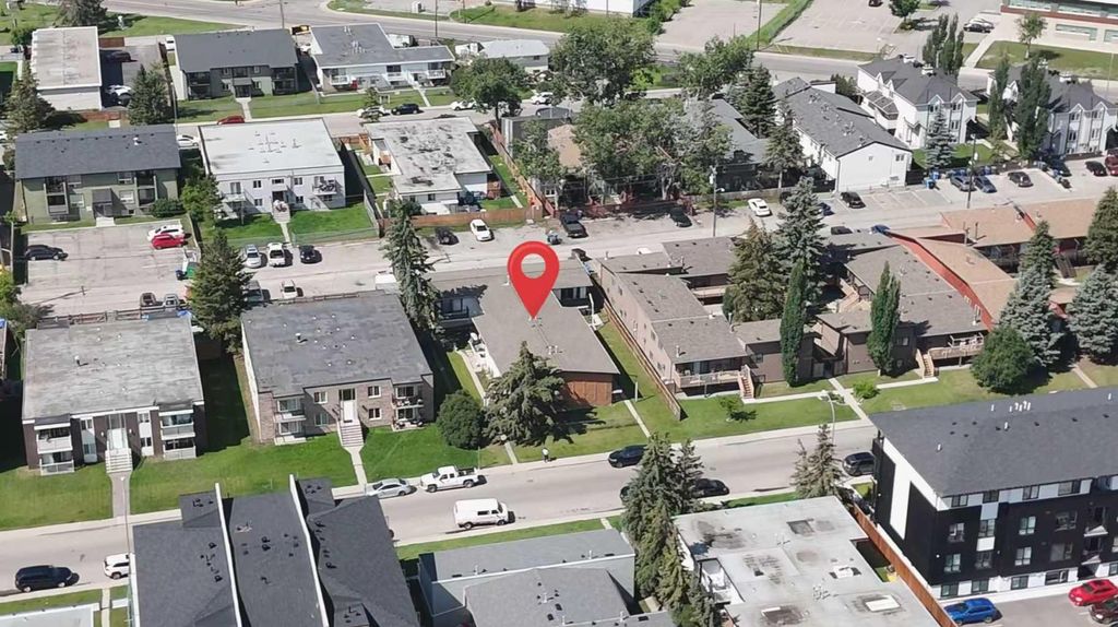 Photo of 4523 73 Street NW #1-8, Calgary, AB T3B 2M3 (MLS # A2328567)