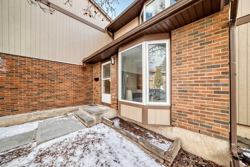 Photo of 6103 Madigan Drive NE #54, Calgary, AB T2A 5K9 (MLS # A2292447)