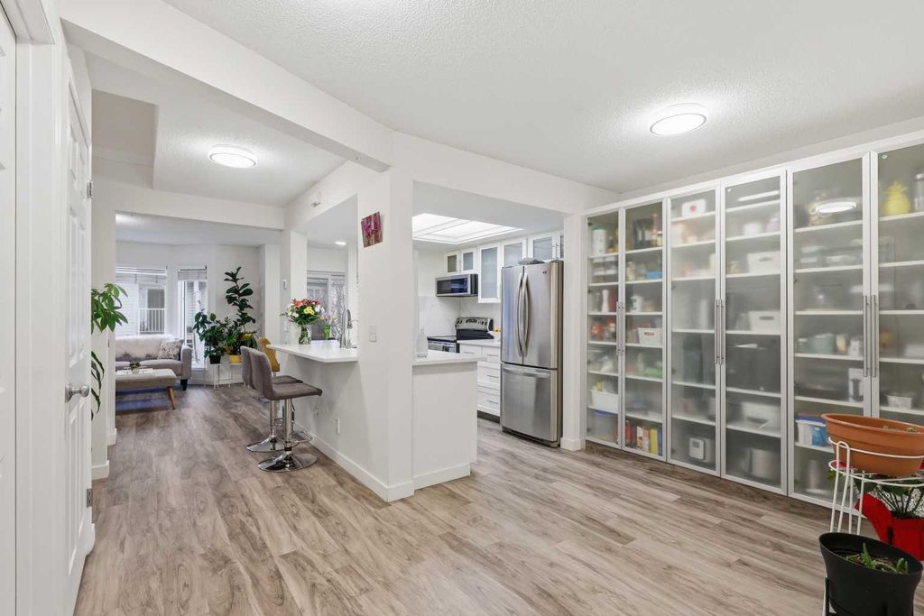 Photo of 310 HAWKSTONE Manor NW, Calgary, AB T3G 2X2 (MLS # A2306089)