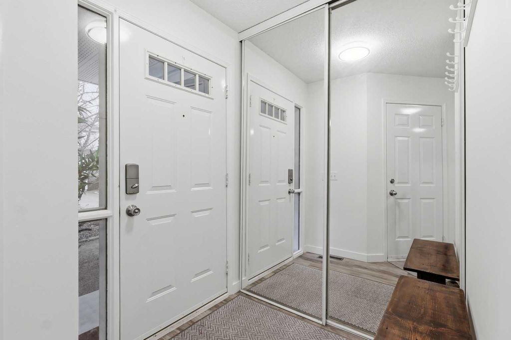 Photo of 310 HAWKSTONE Manor NW, Calgary, AB T3G 2X2 (MLS # A2306089)