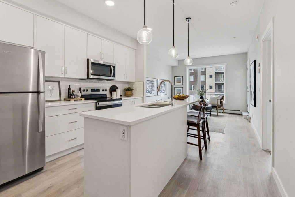 Photo of 655 Shawnee Square SW #201, Calgary, AB T2Y 1E3 (MLS # A2301252)