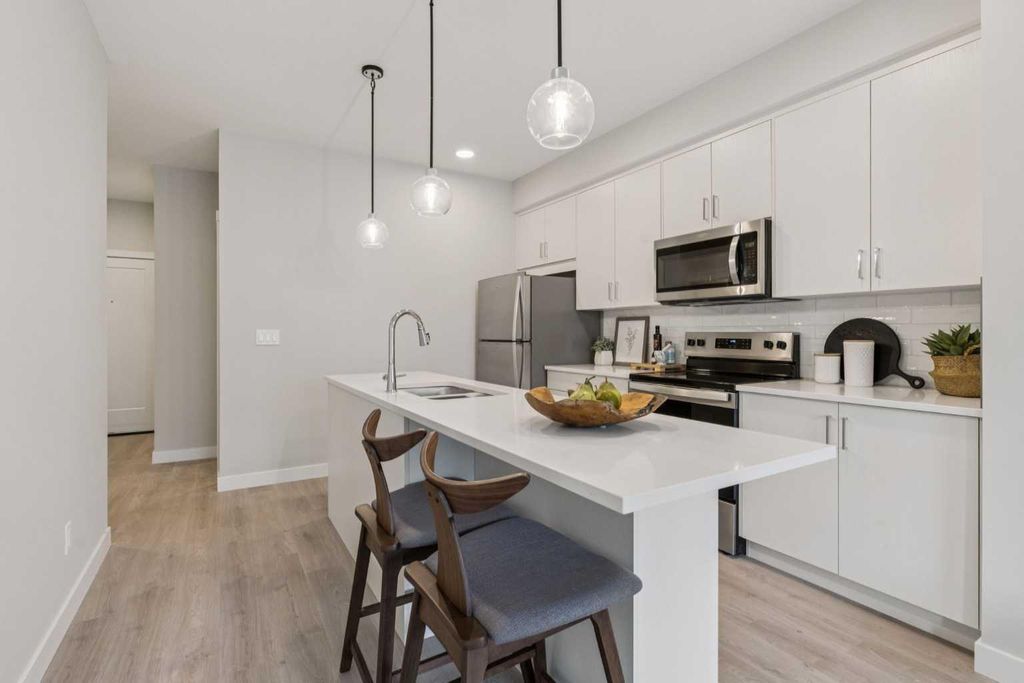 Photo of 655 Shawnee Square SW #201, Calgary, AB T2Y 1E3 (MLS # A2301252)