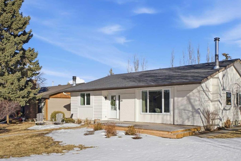 Photo of 36 Lake Adams Place SE, Calgary, AB T2J 3S8 (MLS # A2291814)