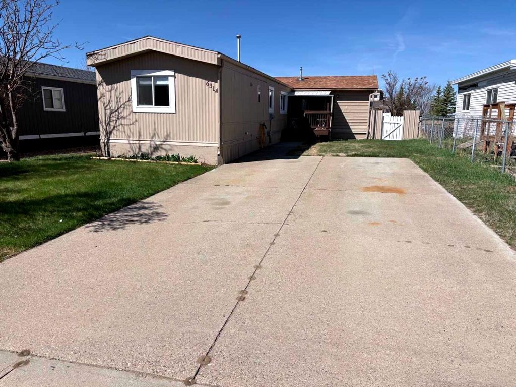 Photo of 6314 48 Street, Taber, AB T1G 1J3 (MLS # A2307041)