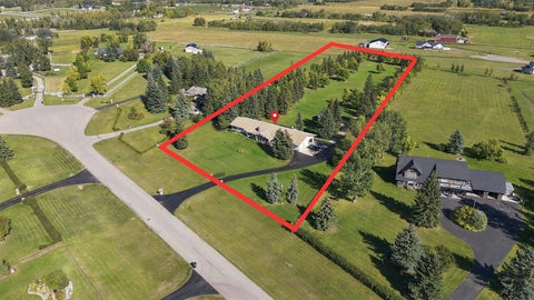 Photo of 266056 24 Street W, De Winton, AB T1S 3M5 (MLS # A2346813)