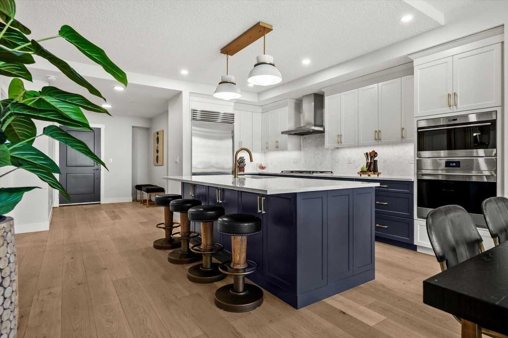 Photo of 15 Cougar Ridge Landing SW #209, Calgary, AB T3H 6C3 (MLS # A2343277)