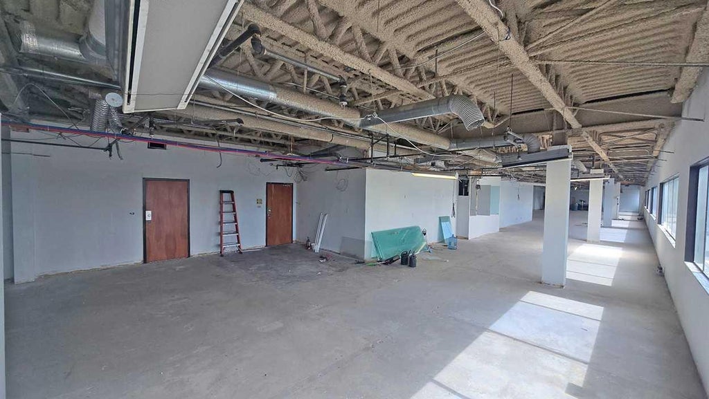 Photo of 4014 Macleod Trail SE #212, Calgary, AB T2G 2R7 (MLS # A2348271)