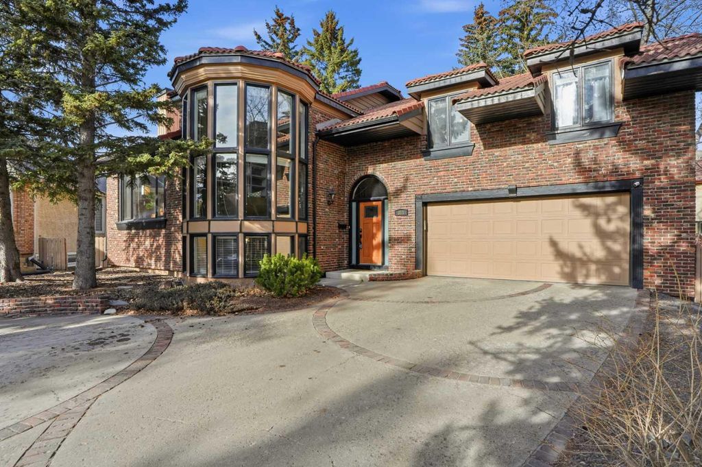 Photo of 311 Coach Light Bay SW, Calgary, AB T3H 1X3 (MLS # A2286955)