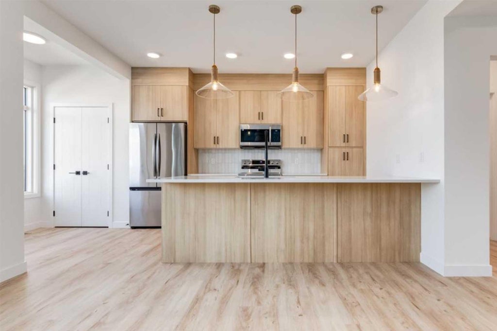Photo of 819 Sora Boulevard SE, Calgary, AB T3S 0M7 (MLS # A2348196)