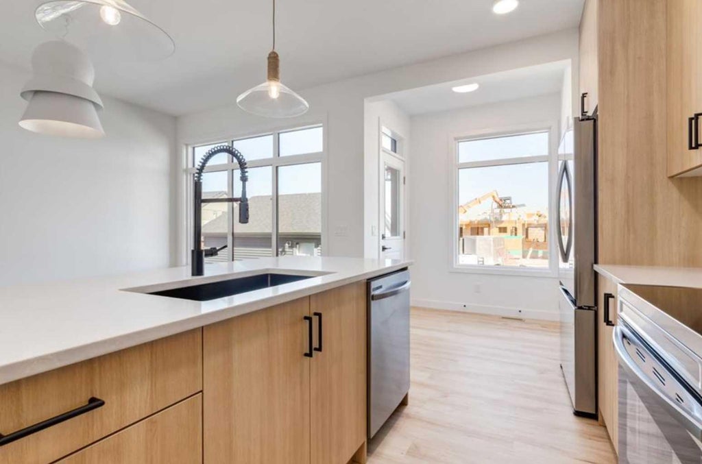 Photo of 819 Sora Boulevard SE, Calgary, AB T3S 0M7 (MLS # A2348196)