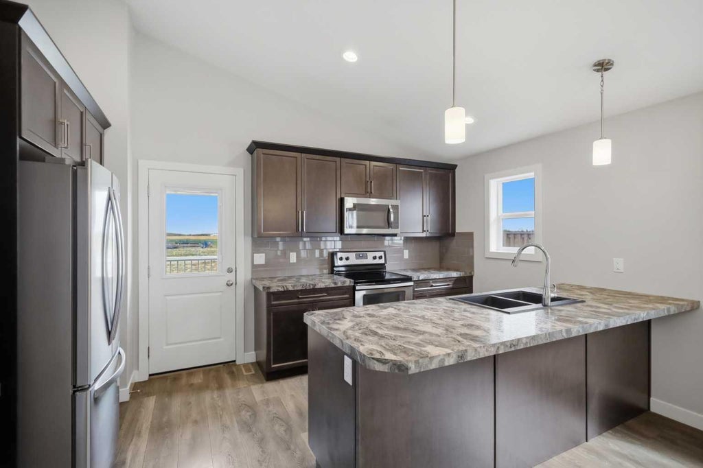 Photo of 4754 Aspen Lakes Boulevard, Blackfalds, AB T4M 0M9 (MLS # A2347255)
