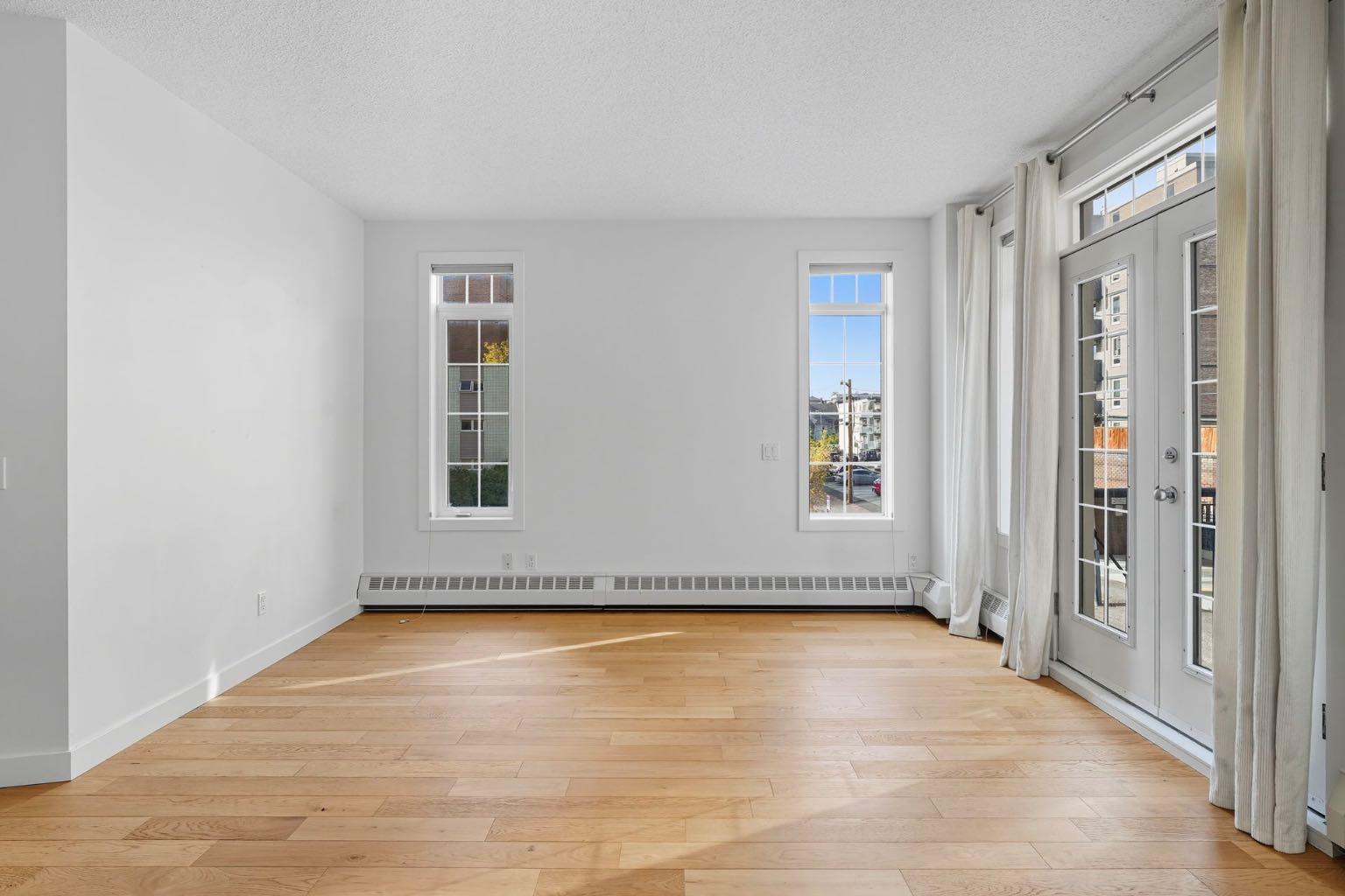 1000 15 Avenue SW 209