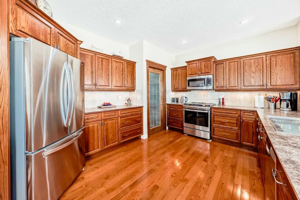 Photo of 487 Rocky Ridge Drive NW, Calgary, AB T3G 5C3 (MLS # A2290057)