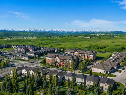Photo of 15 Sunset Square #3106, Cochrane, AB T4C 0E7 (MLS # A2331170)