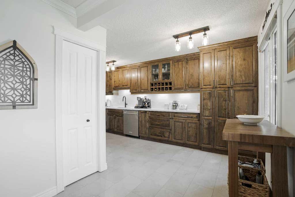 Photo of 108 Norbasca Bay, Fort McMurray, AB T9H 4T6 (MLS # A2338024)