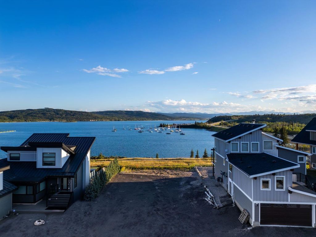 Photo of 407 Cottageclub Grove, Rural Rocky View County, AB T4C 1B1 (MLS # A2289756)