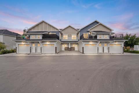 Photo of 115 Sagewood Drive SW #103, Airdrie, AB T4B 0M3 (MLS # A2338106)