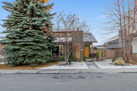 107 Woodford Crescent SW Calgary AB T2W 4C6