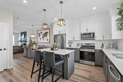 Photo of 136 Dawson Drive, Chestermere, AB T1X 1Z9 (MLS # A2273877)