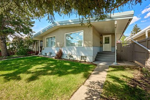 Photo of 812A 69 Avenue SW, Calgary, AB T2V 0P3 (MLS # A2314151)