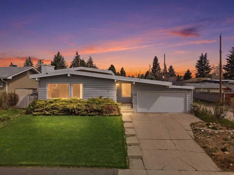 Photo of 6107 Longmoor Way SW, Calgary, AB T3E 5Z8 (MLS # A2309996)