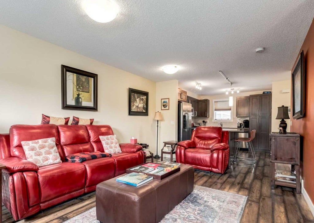 Photo of 1225 Kings Heights Way SE #703, Airdrie, AB T4A 0T7 (MLS # A2351416)