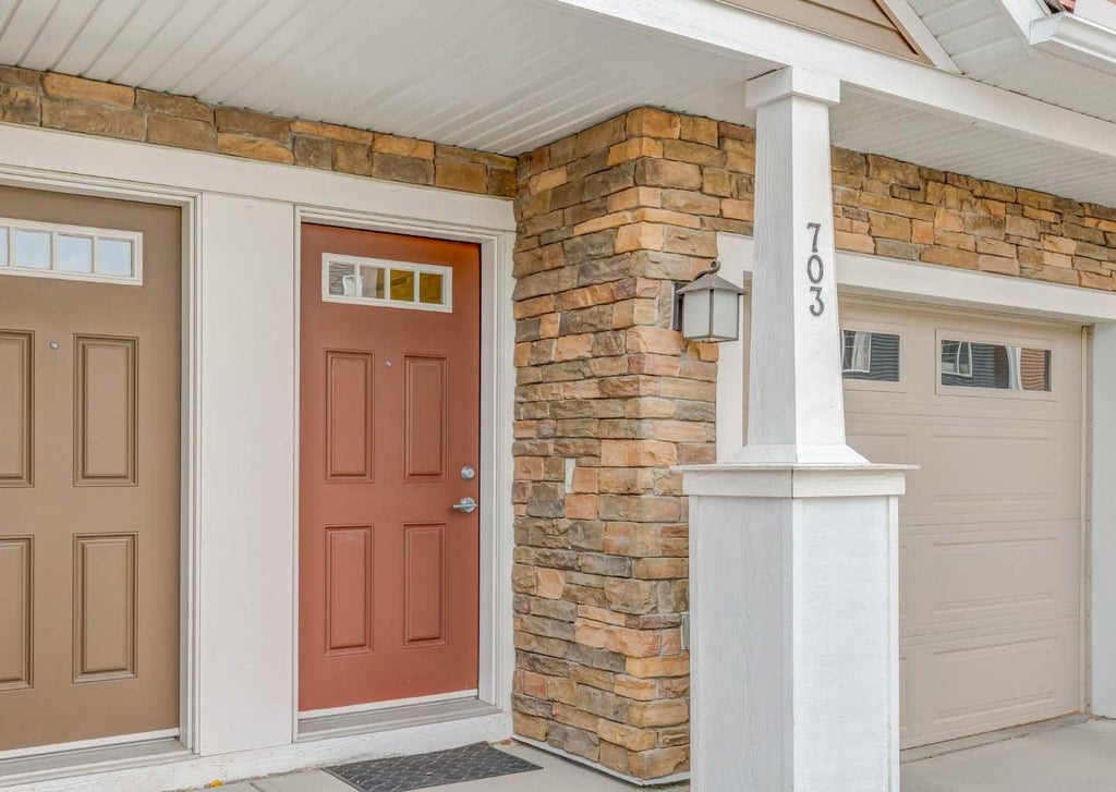 Photo of 1225 Kings Heights Way SE #703, Airdrie, AB T4A 0T7 (MLS # A2351416)