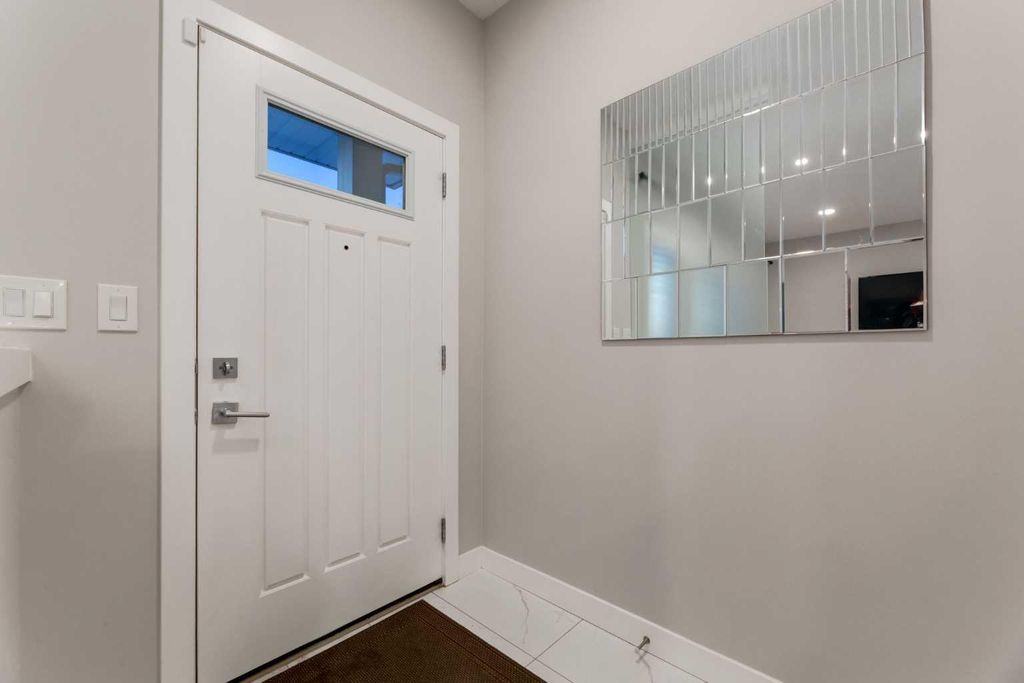 Photo of 1217 CARRINGTON Boulevard NW, Calgary, AB T3P 1M2 (MLS # A2300015)