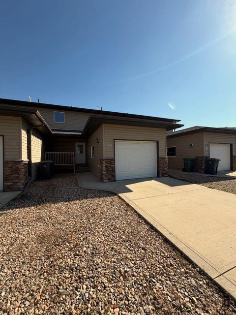 Photo of 5511 54 Street #2, Ponoka, AB T4J 1L9 (MLS # A2347094)