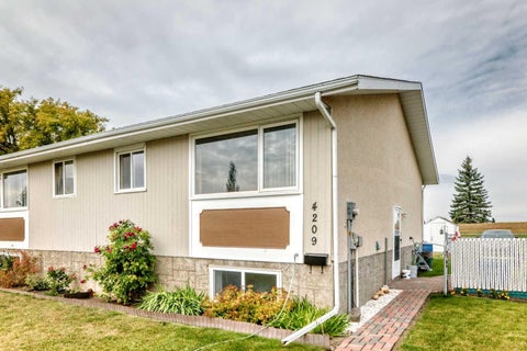 Photo of 4209 54 Avenue, Innisfail, AB T4G 1K4 (MLS # A2347342)