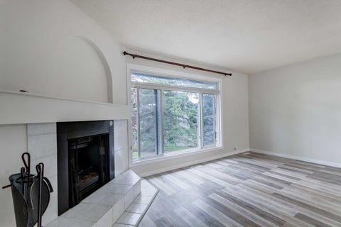 Photo of 310 Brookmere Road SW #12, Calgary, AB T2W 2T7 (MLS # A2341725)