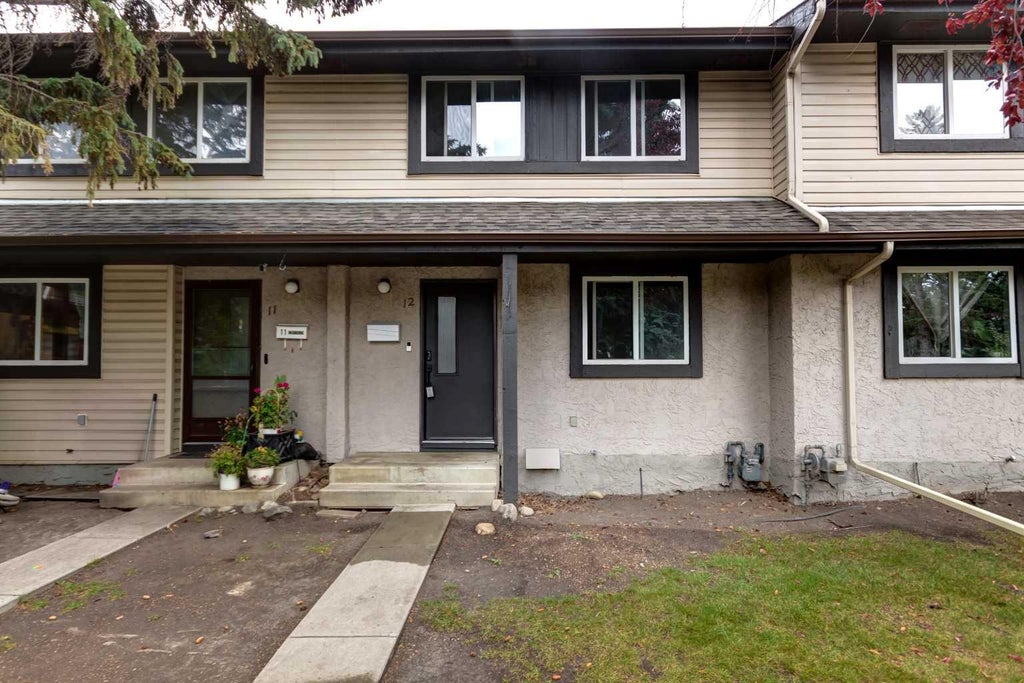 Photo of 310 Brookmere Road SW #12, Calgary, AB T2W 2T7 (MLS # A2341725)